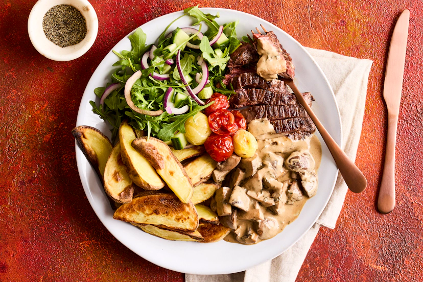 Golden oven-baked wedges, fast-fried bavette steaks (the butcher’s favourite cut), served with herby mushrooms, roasted tomatoes and a salad of red onion, cucumber and rocket. Shut your eyes and you’ll be in a French bistro!