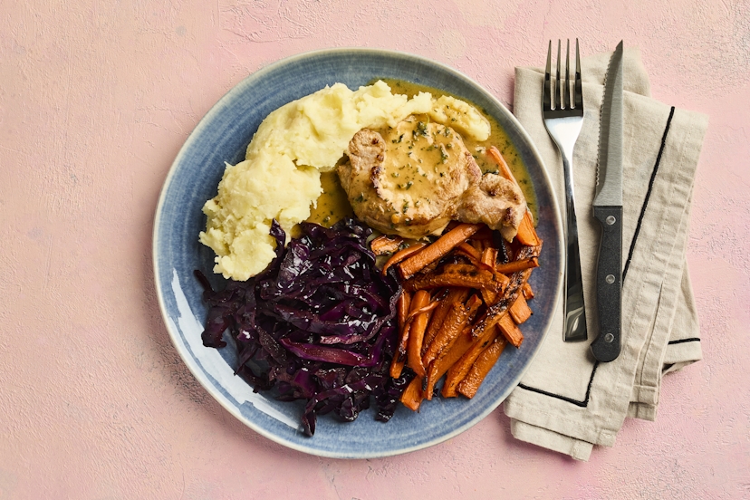 This has got Sunday dinner written all over it! Tender pork loin medallions are pan-fried and served with creamy parsnip mash, roasted carrots and braised red cabbage – all drizzled with a savoury garlic and thyme gravy. Just one word – delish!