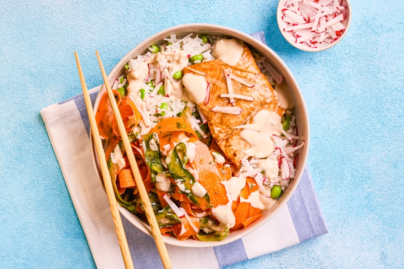 Poke bowls (pronounced po-kay) originated in Hawaii, and they’re popping up on menus everywhere. Ours combines baked salmon with rice and edamame beans, ribbons of carrot and cucumber, plus crisp radishes, and it zings with flavours of lime, ginger and tamari (Japanese soy sauce) – you’ll be bowled over!