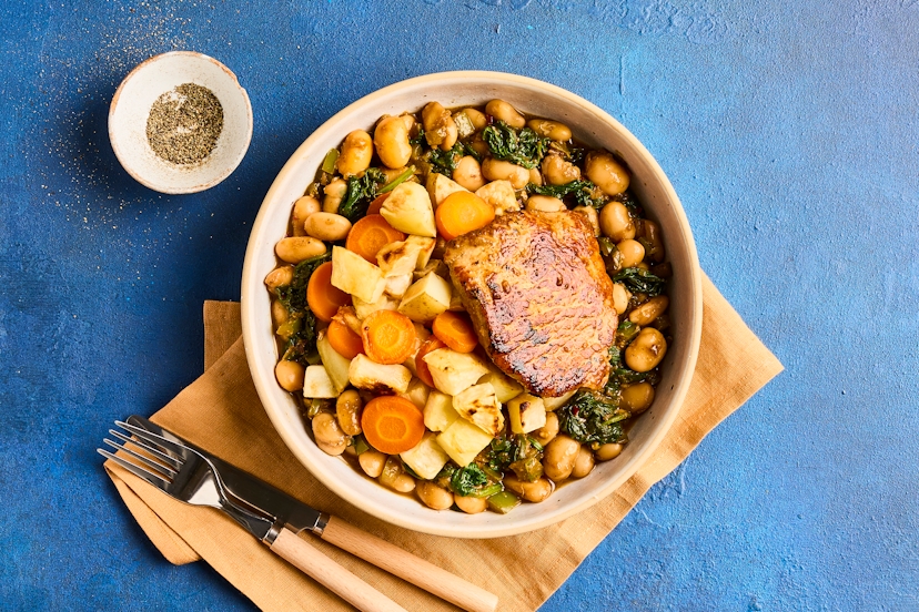 A classic of French country cooking, cassoulet is the ultimate comfort food. We’ve combined tender pork loin with butter beans and spinach in a creamy garlic and herb sauce, and served them with roasted potatoes, carrot and celeriac.