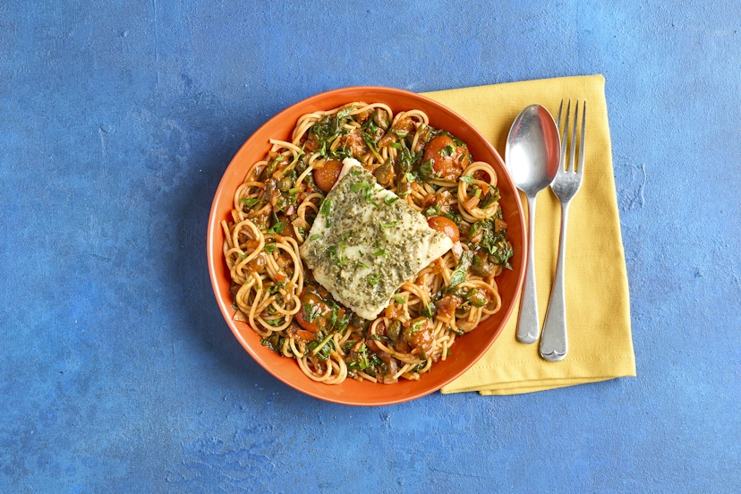 Cod fillets are covered in our garlic, basil and parsley paste, then baked till they flake apart on your fork. Add a pile of spaghetti, in a garlic and chilli tomato sauce with capers and spinach stirred through, and you’ve got a tangy, fabulously filling fish supper that’s on the table in just over half an hour.