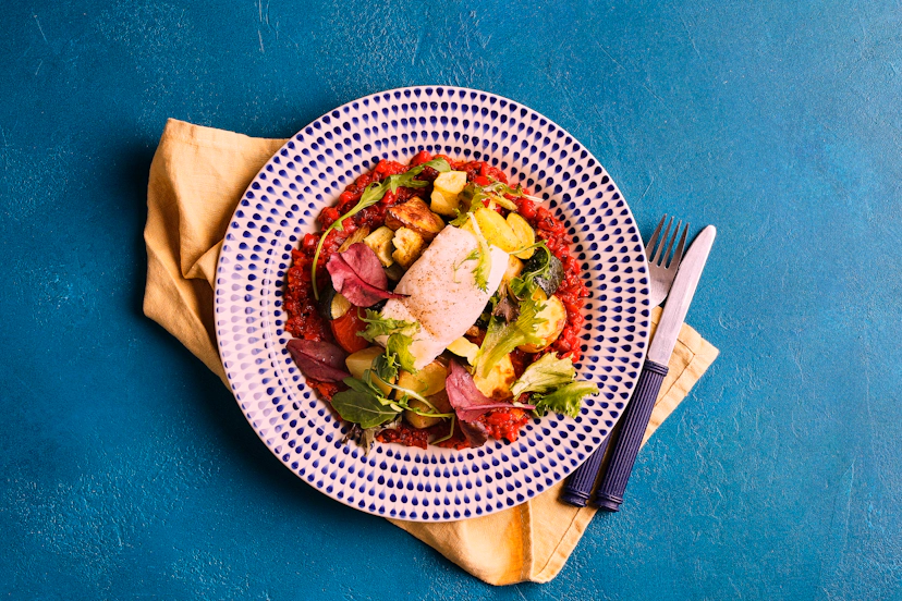 A posh fish supper that’s also seriously satisfying! Cod steaks are roasted to perfection on a bed of garlicky, smoky Med veg, which you then chop up to make the chunky red pepper sauce. Dish up with roast baby potatoes and courgettes for the full bistro experience.