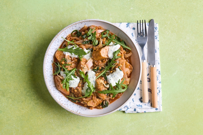 Pork sausages are at the heart of our quickie tomato-based casserole, but they’re far from the whole story… This taste bud-tickling medley features satisfying lentils, fragrant fennel and tarragon, spinach and tangy capers. Then pow, there’s a rocket & mustard yogurt dressing, too! And we all dined happily ever after, the end.