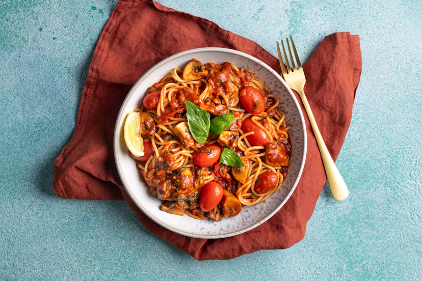 This dishy little number is seriously saucy! Porcini and chestnut mushrooms are sizzled and simmered with tomatoes and shallots in a lip-smacking sauce infused with fragrant basil, garlic and zesty lemon and stirred through spaghetti.