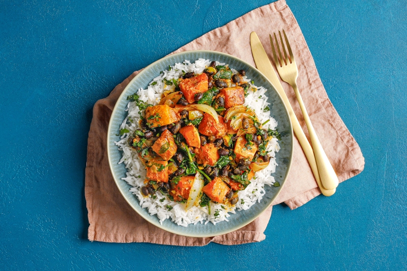 This vegan dopiaza doubles down on the tasty onion fun, by featuring both roasted and sautéed onion. With cumin-sprinkled butternut squash, black beans and spinach, on a bed of fluffy rice, this mildly spiced curry makes for suppertime satisfaction.