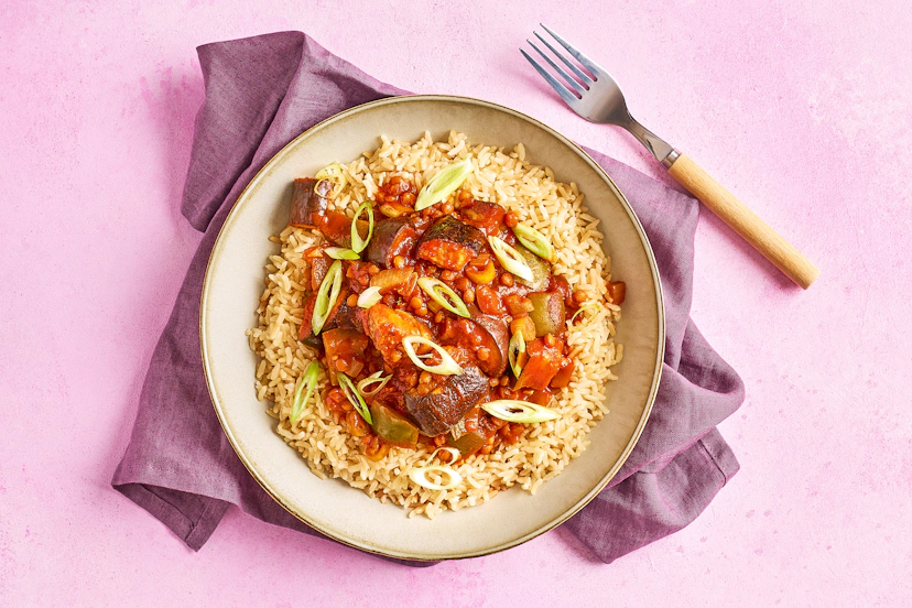 Aubergines and lentils are a match made in heaven in this super-filling Mexican stew. They’re cooked with onion and green pepper in a tomato sauce rich with garlic, chipotle paste and smoked paprika, served over fluffy basmati rice with a sprinkling of spring onion.