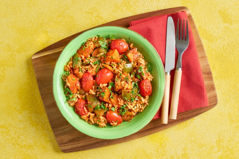 Soft, sticky sweet potatoes are at the heart of this Louisiana-style soul food feast, which also features green pepper, baby tomatoes and wholesome brown rice, simmered in a rich tomato sauce that’s perked up with garlic, oregano, smoked paprika and a sprinkling of chilli flakes.