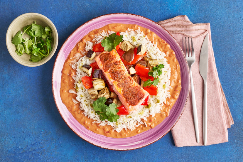 Take a walk on the mild side with a fragrant feast ready in 30 mins flat! Plump salmon fillets are spiced with our bespoke Thai paste, then grilled alongside aubergine and peppers. Meanwhile, stir-fried onions and chillies simmer in a tomatoey sauce spiked with more Thai paste and fish sauce, finished with yogurt and coriander. Serve with zesty lime rice and devour!