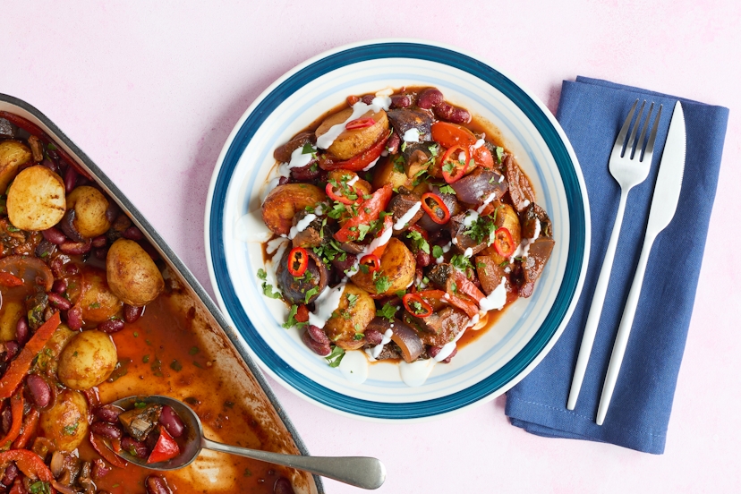 Hey, fancy heading down Mexico way – in a single tray? Sprinkle baby potatoes, red pepper, onion and mushrooms with our bespoke Mexican spice mix, plus smoked paprika and oregano, then roast. Next, stir in kidney beans, passata and stock and bake some more. Top with chilli, yogurt and fresh coriander and settle down to a fuss-free feast with fiesta vibes!