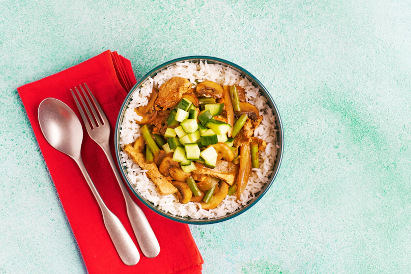 Goodness, gracious miso! This dish is bold, deeply savoury and utterly delicious! Sizzled pork strips, shallots, mushrooms and green beans are simmered in a gingery miso and tamari broth, then spooned onto a bed of fluffy rice and topped with tangy pickled cucumber.