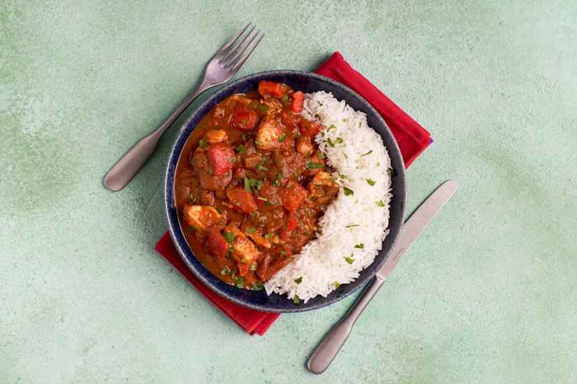 Fast-track your tea with this nifty rogan josh, whipped up with a pouch of our delicious and super-convenient ready-made curry sauce. Simply sizzle onions, peppers, baby toms and diced chunks of chicken breast in a fragrant spice paste, stir in the aromatic sauce and simmer till thickened. Just 20 mins later, sprinkle with coriander, serve with rice and get stuck in!