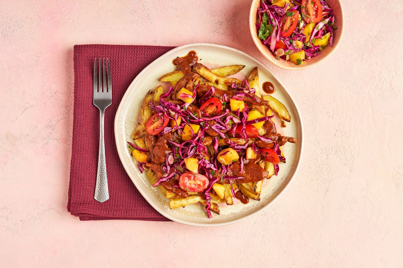 Thin fries baked (or air-fried) with onion make the perfect base for this seriously saucy dish. Tender duck strips are fried, then simmered in a spicy sauce of passata and our bespoke jerk seasoning. Meanwhile, a zingy mix of mango, tomato, red cabbage and spring onion are given extra oomph with coriander and a squeeze of lime. It’s so delish it’ll drive you quackers!