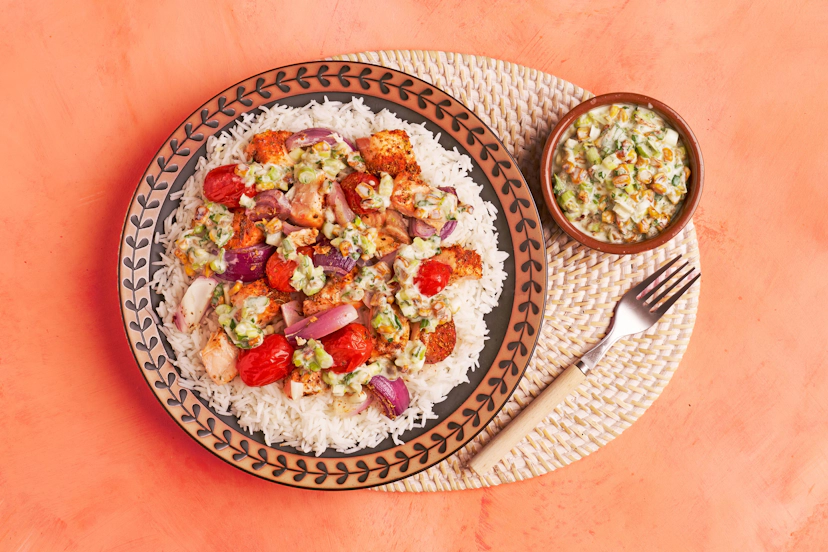 Inspired by the beloved Mexican street food – esquites – our zingy salsa of charred corn, spring onions, jalapeños, garlic, coriander and yogurt is the perfect amigo to spiced salmon fillets, roasted red onions and baby tomatoes. A base of basmati rice balances the heat and guarantees satisfaction.