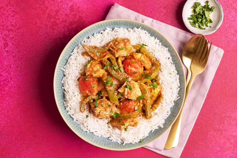 Mild thing, you make our plates sing! And this subtly spiced curry-in-a-hurry couldn’t be simpler. You’ll sizzle a classic jalfrezi base of onion, pepper and tomato with chicken, cumin and coriander seed, then crack open our special Slimming World curry sauce. A short simmer later it’s time to add fresh coriander and a swirl of cooling yogurt before serving with a mound of fluffy rice.