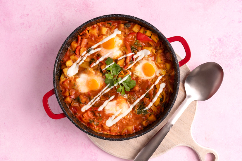 This is sunny side up, South Asian style… Cumin-spiced home fries (aka cubed roasties), red peppers, onions and wilted spinach in a fragrant tomatoey curry sauce, finished with a squiggle of cooling Greek-style yogurt. And let’s not forget the reason we’re all here: perfectly poached eggs with wobbly golden yolks. Yum!