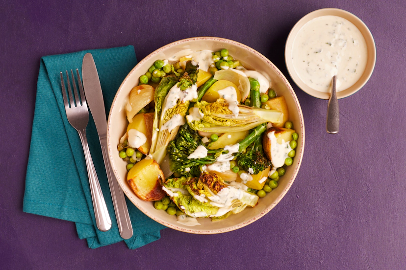 Fresh, light and blooming with flavour, this bung-it-in beauty brings all the joys of spring to your next box! Think roasted baby potatoes and onion, Tenderstem broccoli, gem lettuce (yes, it’s firmly in its ‘hot era’) and peas, all bubbling away in a tasty garlic and caper broth and finished with a drizzle of basil and miso yogurt. A trayful of sunshine, sorted.