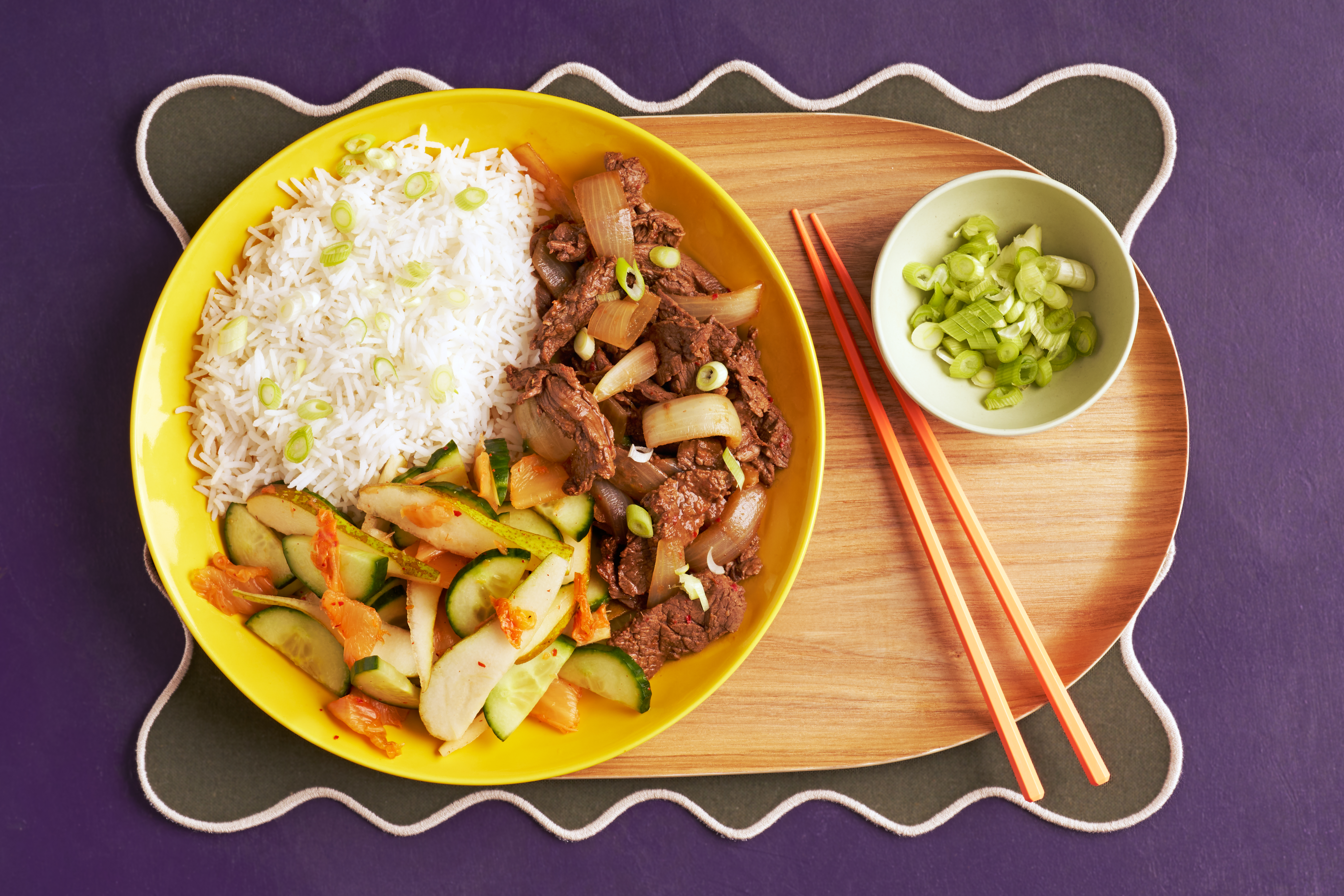 Korean steak with kimchi cucumber and rice