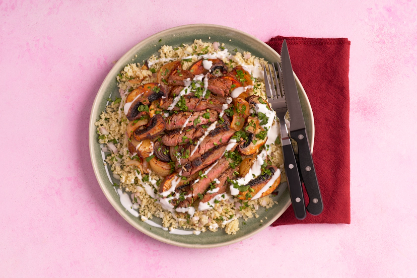 Harissa-rubbed steaks and spicy portobello mushrooms and onions bring the heat, while a bed of herby, lemony couscous provides fresh, zesty balance. It’s still steak night, just with a little more attitude!