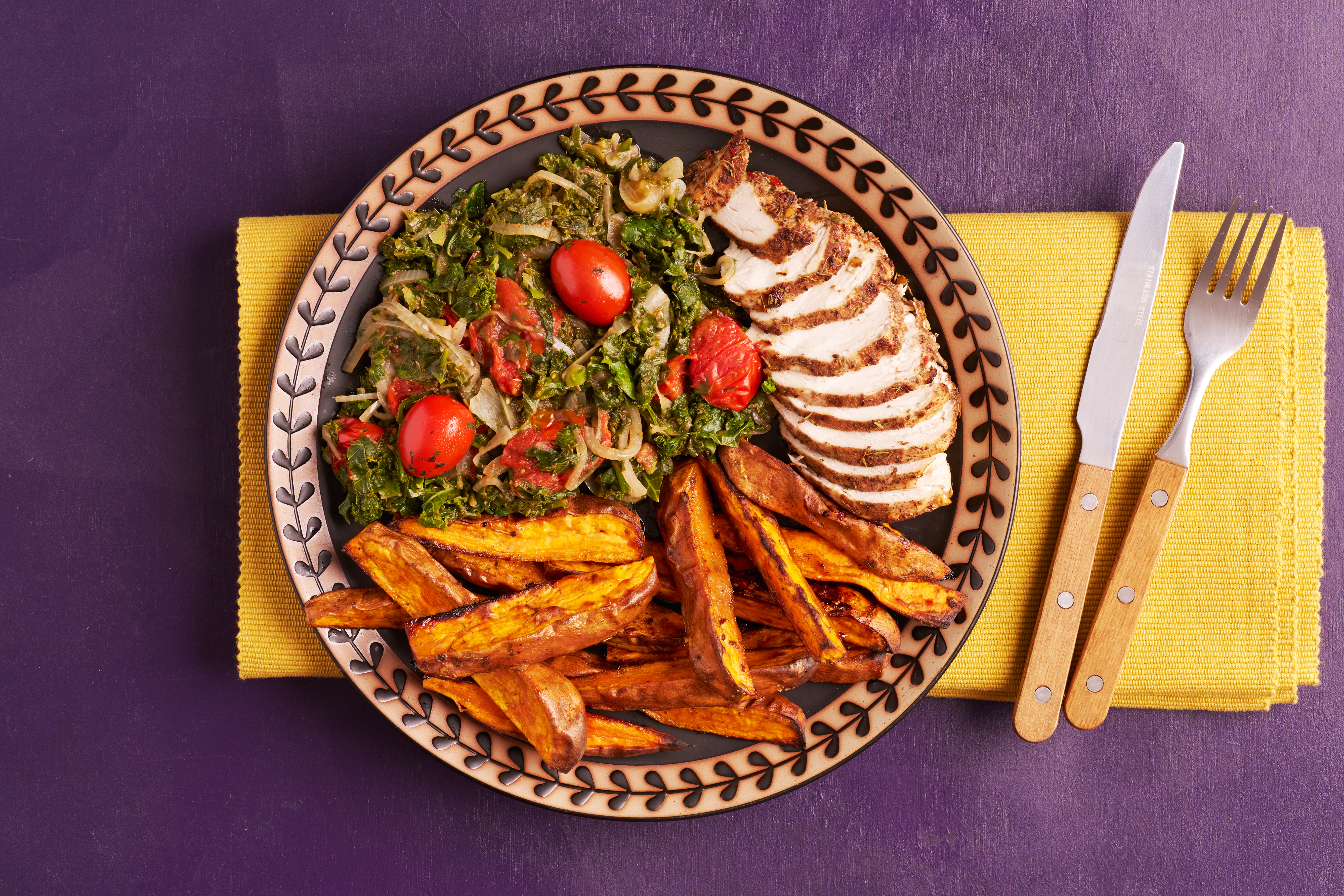 Jerk-style chicken with sweet potato wedges